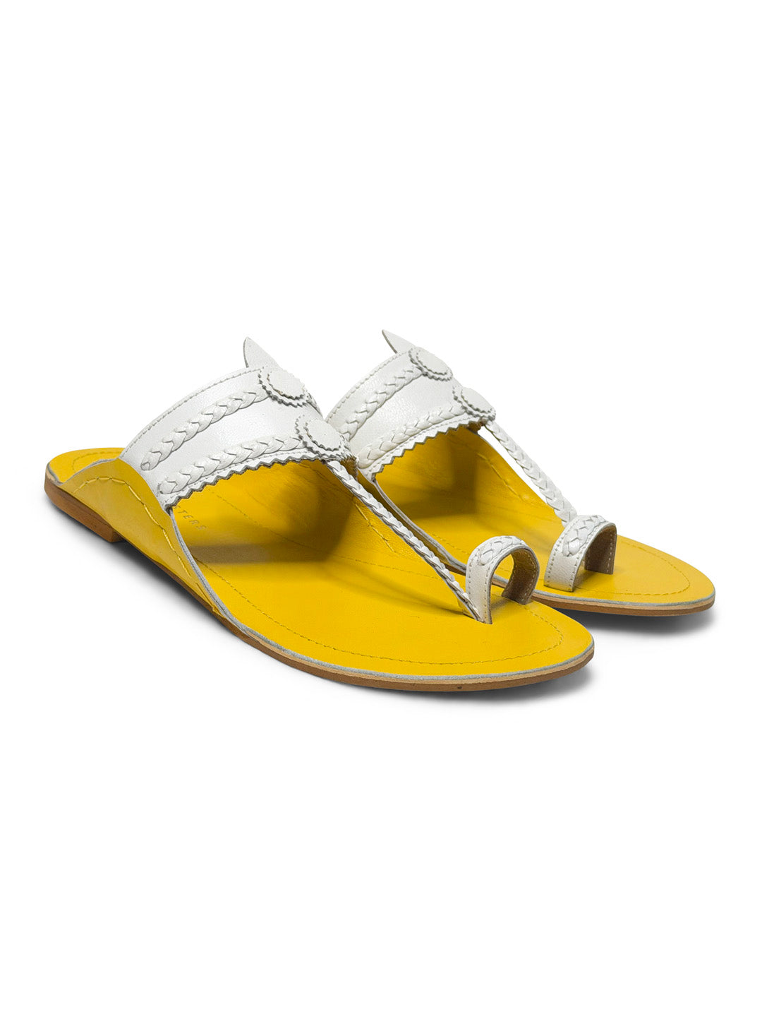 Kolhapuris flat sandals, handcrafted, india, traditional artisanal techniques, slip-on, heritage design, Kolhapuri style, pop colors, modern twist, iconic shape, leather sandals, cultural craftsmanship, relaxed fit, sandali in pelle, sandali indiani, summer shoes, scarpe estive